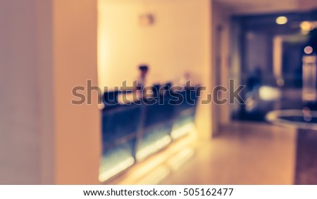 image of Abstract blur people at hotel lobby for background usage . (vintage tone)