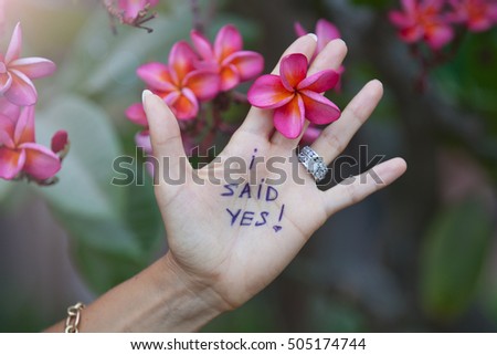 Proposal on resort. Woman said yes. Royalty-Free Stock Photo #505174744