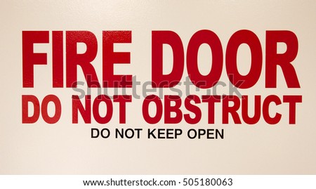 Fire Door Do Not Obstruct sign.