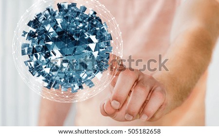 Businessman on blurred background touching flying abstract sphere with shiny cube 3D rendering
