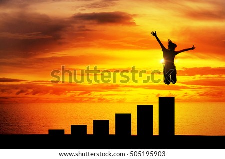 Silhouette, personal development and career growth, Business or education concept growth success process, Woman jumping on chart in the beach. Royalty-Free Stock Photo #505195903
