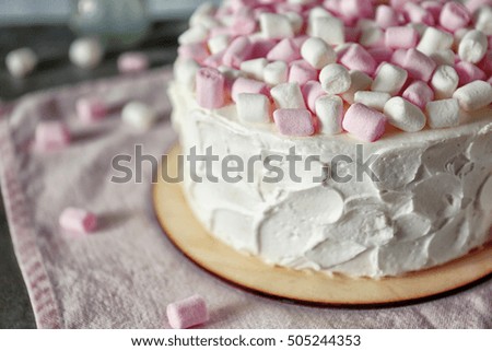 Delicious cake with marshmallows, close up