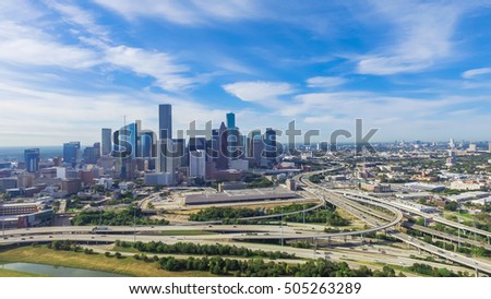Panoramic aerial view Downtown with Interstate 10, 45 and Gulf freeway intersection. Massive highway, stack interchange, viaduct and elevated road junction overpass from Northeast Houston, Texas, USA.