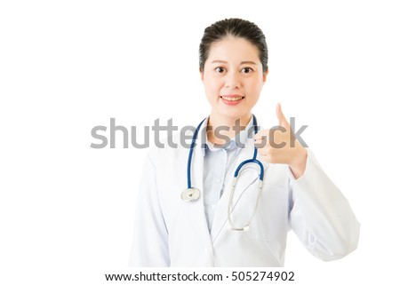 Smiling asian woman doctor with stethoscope show thumb up. isolated on white background. asian female model. medical and health concept