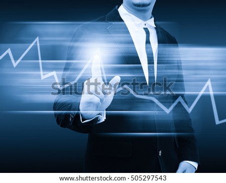 businessman hand pushing a business graph