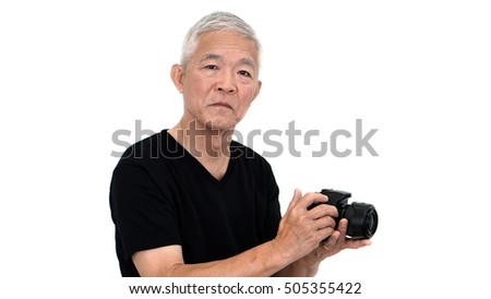 Asian elderly guy start taking photo to sale online for extra income