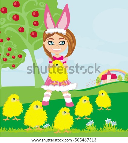 girl in bunny costume and sweet small chicks