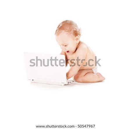 picture of baby boy in diaper with laptop computer