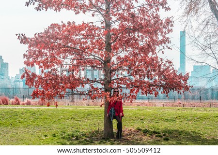 Photo of Girl in front of trees at Central Park in Manhattan, New York City