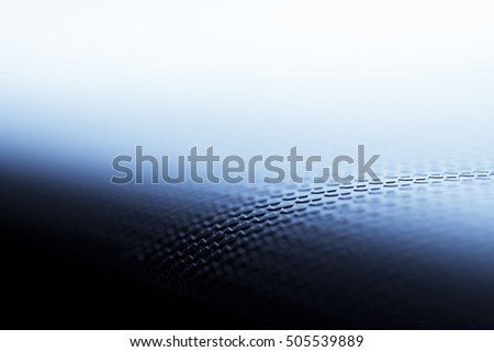 Textured blue background surface with modern pattern