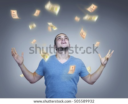 Glowing money raining over successful young man
