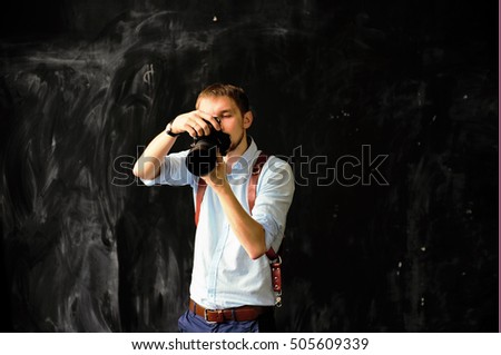young man with camera 