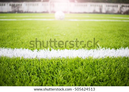 Artificial turf football field green white grid, success concept