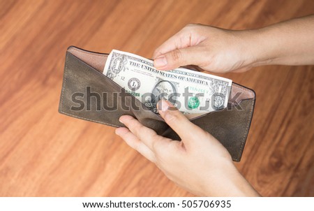 last one dollar money banknote in wallet, bankrupt concept.