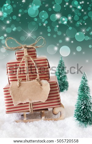 Christmas Sled On Snow With Vertical Green Background, Copy Space