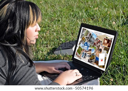 A young woman viewing or editing a gallery of photos on her laptop computer.