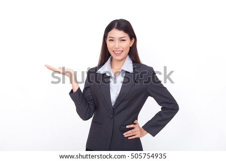 businesswoman pointing side on with background