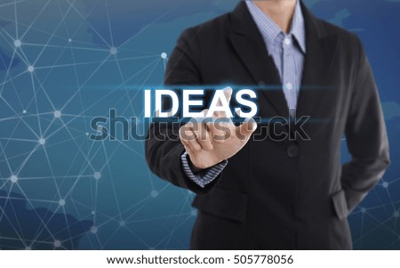 Businessman hand pressing button ideas. sign on virtual screen. business concept.