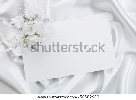 The wedding invitation with a bouquet of the bride on a white background