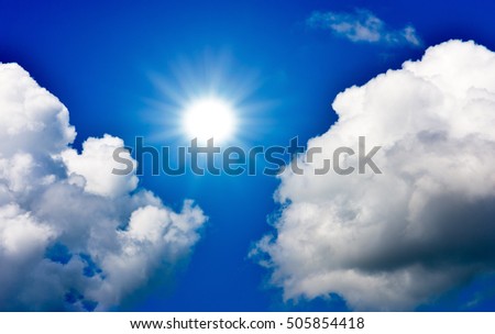 blue sky clouds and sun