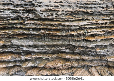 sedimentary rock pattern texture background. Royalty-Free Stock Photo #505862641