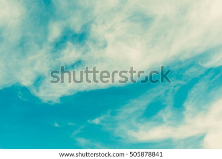 vintage tone image of blue sky and white clouds on day time.