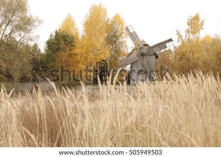 Autumn landscape with old mills