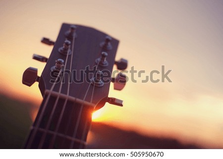 guitar acoustic and sunset