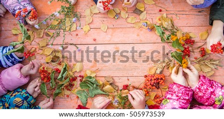 Children's hand make autumn frame
