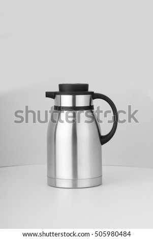 Thermo or Thermo flask from stainless stee on background