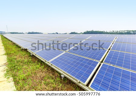 Solar power and photovoltaic panels under the blue sky white clouds.