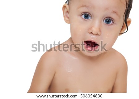 Baby girl bathing in the bathroom, beautiful, a look of surprise, white background