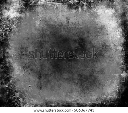 Grey Scratched Grunge Abstract Texture Background. Scary halloween poster with faded central area for your text or picture and frame