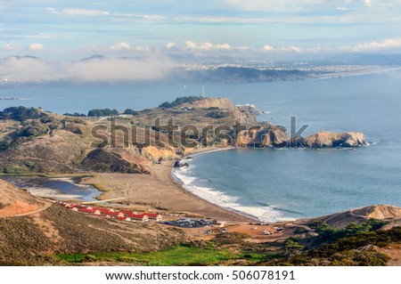 Rodeo Beach, Fort Cronkhite and San Francisco in the Background. Sausalito, Marin County, California, USA.  Royalty-Free Stock Photo #506078191