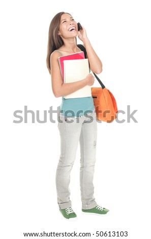 Woman college student standing isolated in full length. Mixed race Asian Chinese / caucasian. Female university student talking in mobile phone. Cutout isolation on white background.