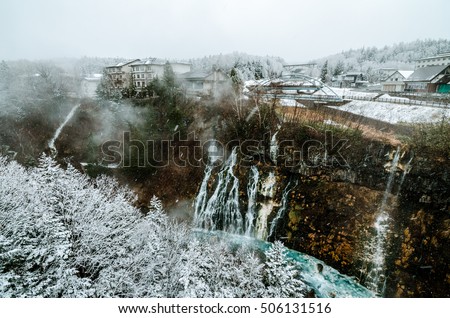 A scenic view of Turquoise waterfall of Shirahige at Biei, Hokkaido, Japan. This picture was taken during winter.