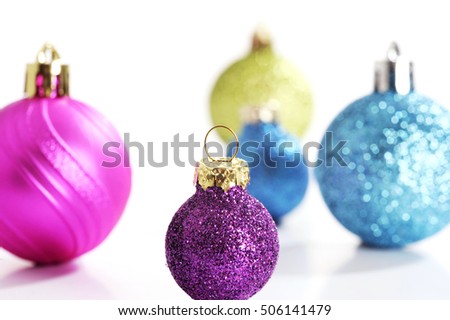 colorful Christmas ball close up on white