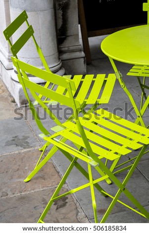 Pair of chairs outside of the restaurant