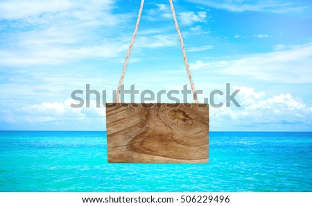 Empty hanging banner with beach background