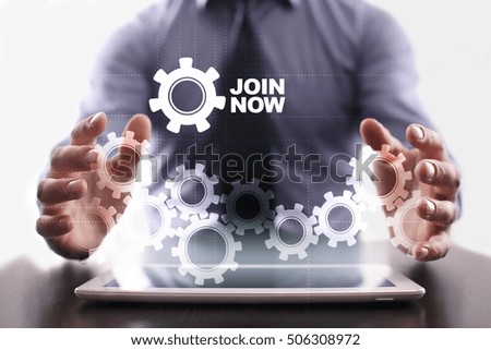 Businessman is using tablet pc and selecting join now