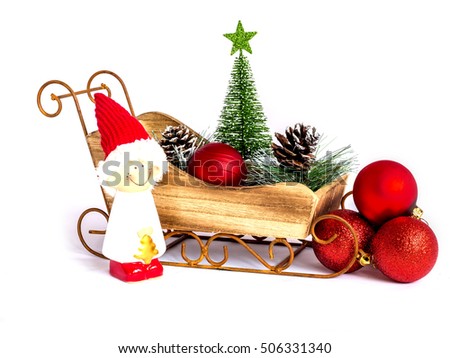 Christmas background with sleigh christmas.Celebration background with sleigh christmas isolated on white.Christmas tree,red balls,Conifer cone,Santa  Claus on white background