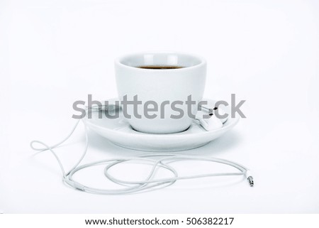 Cup of the with headphone, in studio.