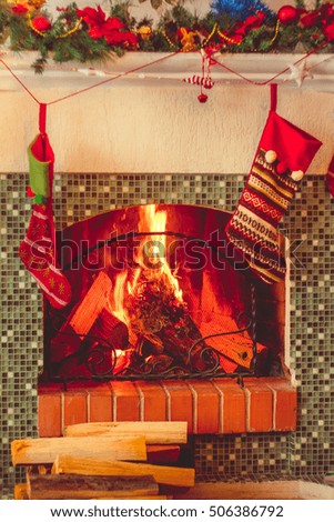 decoration of the fireplace with socks