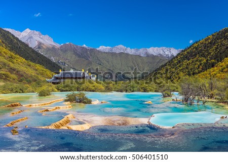 Scenic Huanglong area in Sichuan province, China. Known for its colorful pools formed by calcite deposits, it is a very popular tourist destination. Pictured here is the Multi-Colored Pond.