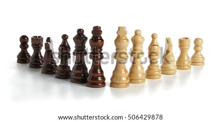 The photograph shows all of the pawns used in the game (light brown as well as dark) made of wood arranged in a row with a triangle shape. 