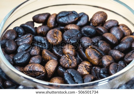 close up of robusta beans hand roasting