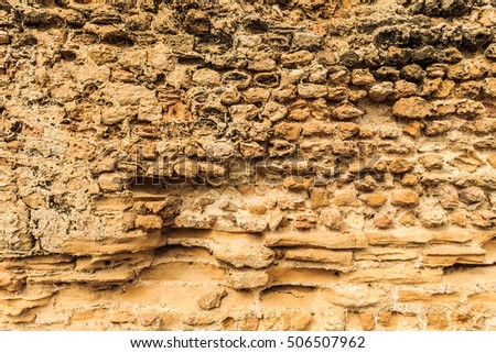 Background of ancient  stone wall. Texture of old brick. Roman architecture.