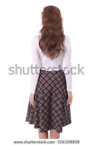 pretty young woman wearing check skirt and white top