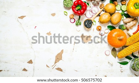 Healthy food. Organic raw vegetables . On rustic background 