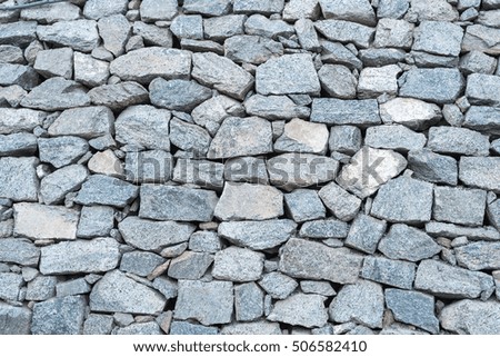 Rock wall seamless texture and background